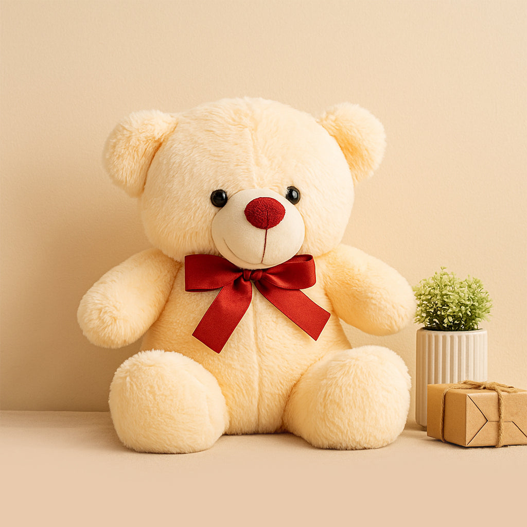 Peach Teddy Bear with Red Bow