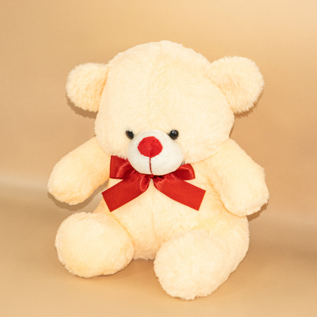 Peach Teddy Bear with Red Bow