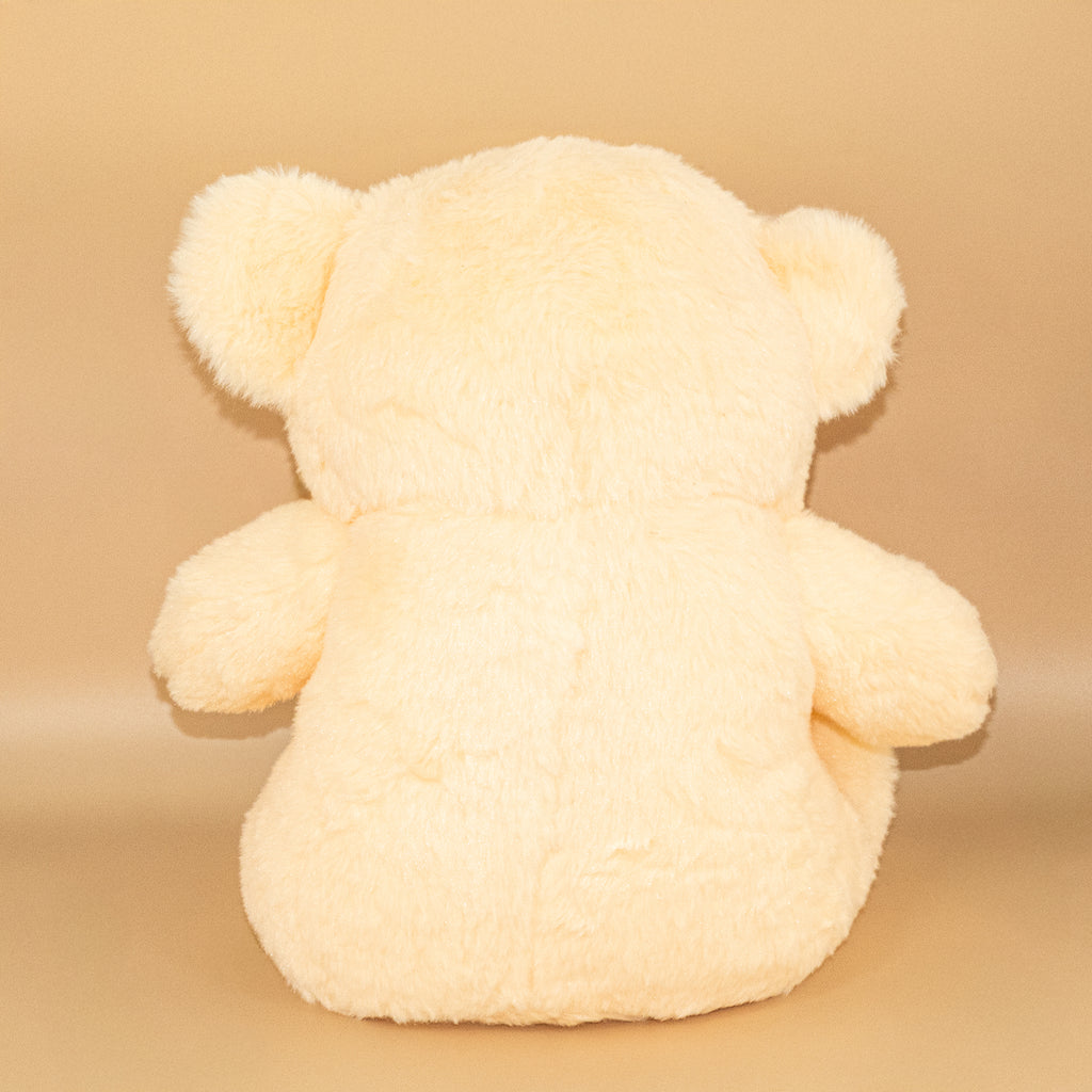 Peach Teddy Bear with Red Bow