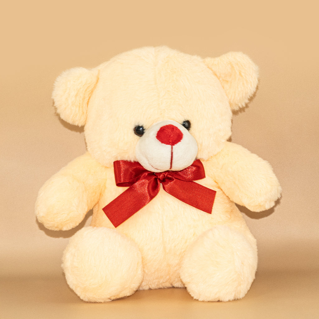 Peach Teddy Bear with Red Bow